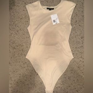 Forever 21 sleeveless bodysuit with shoulder pads. Small. NWT.